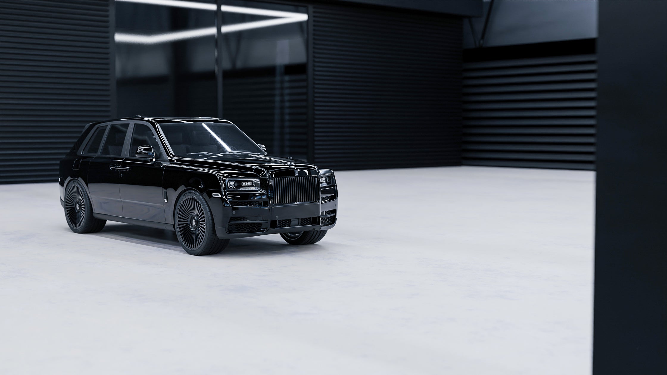 Rolls-Royce Cullinan Black Badge with the LOMA lowering kit and 24-inch wheels.